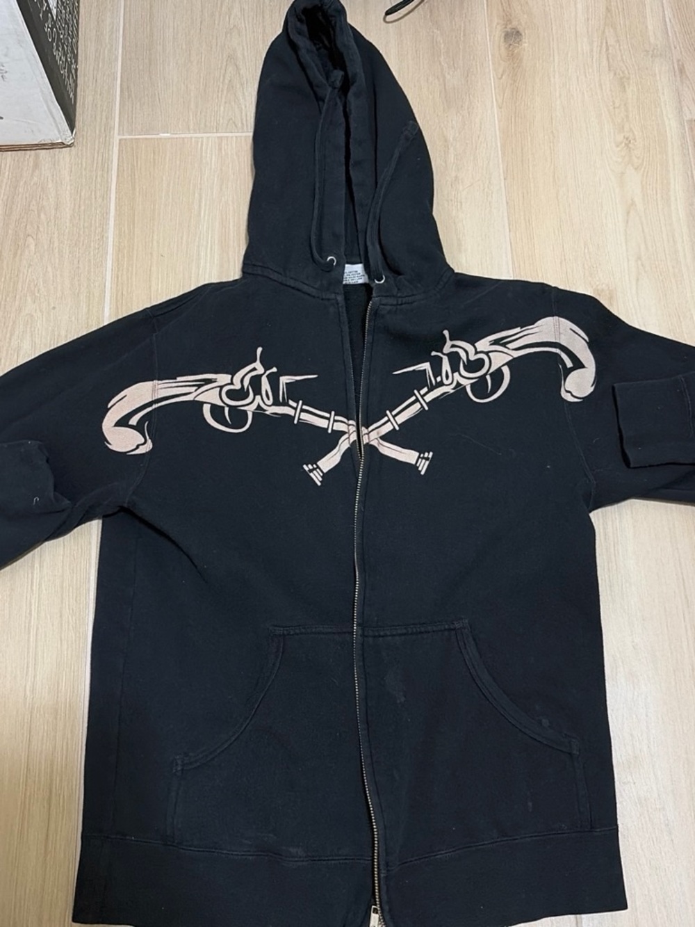 Black Hooded Zip Sweatshirt with Beige Crossed Pistol Graphic